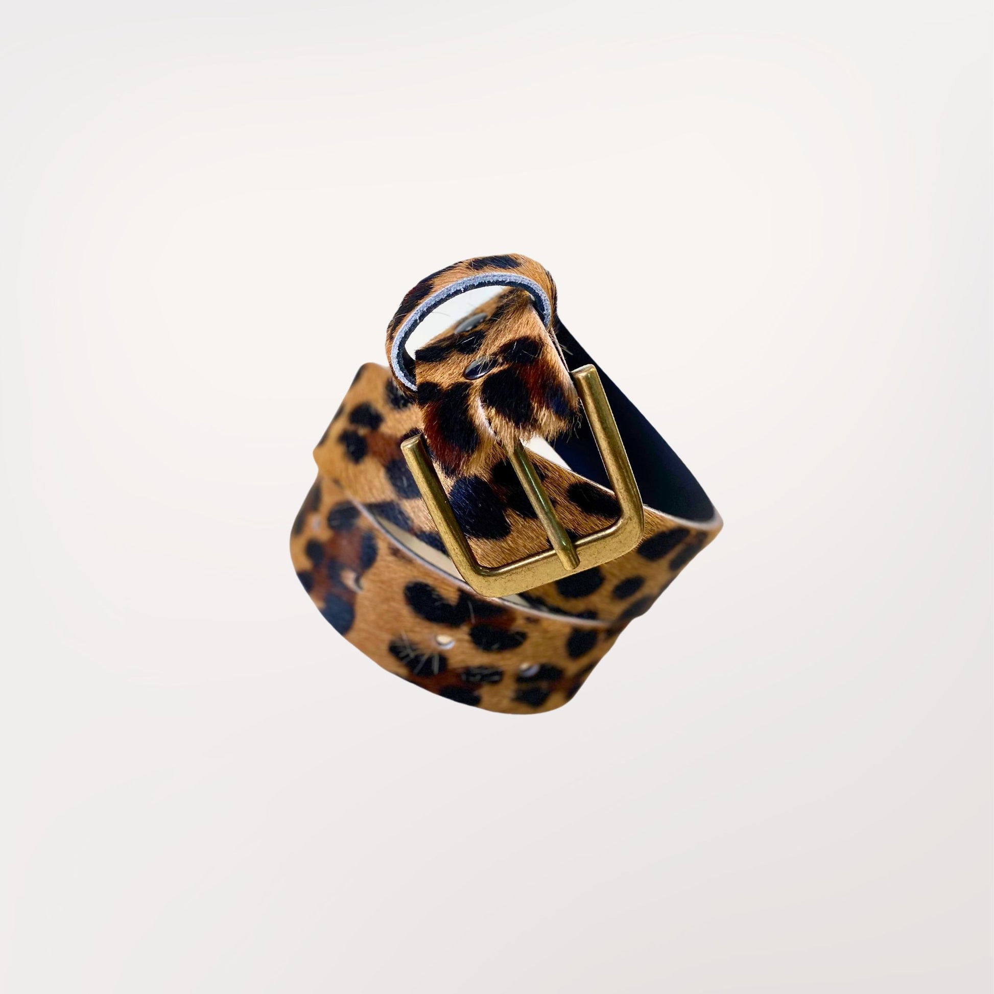 ceinture peau de vache imprimée façon léopard boucle effet laiton