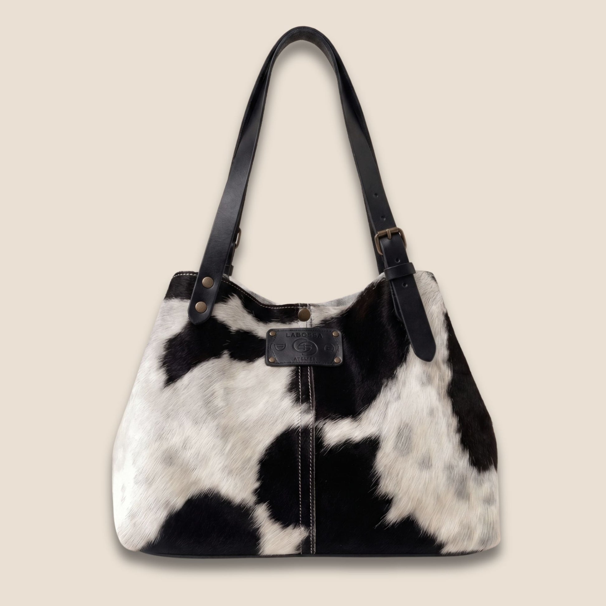 Cabas peau de vache Holstein – forme structurée, vue de face – Labossa Atelier