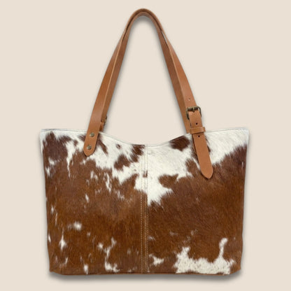 Cabas peau de vache Montbéliarde N°27/133 – vue de dos, lanières cuir box cognac