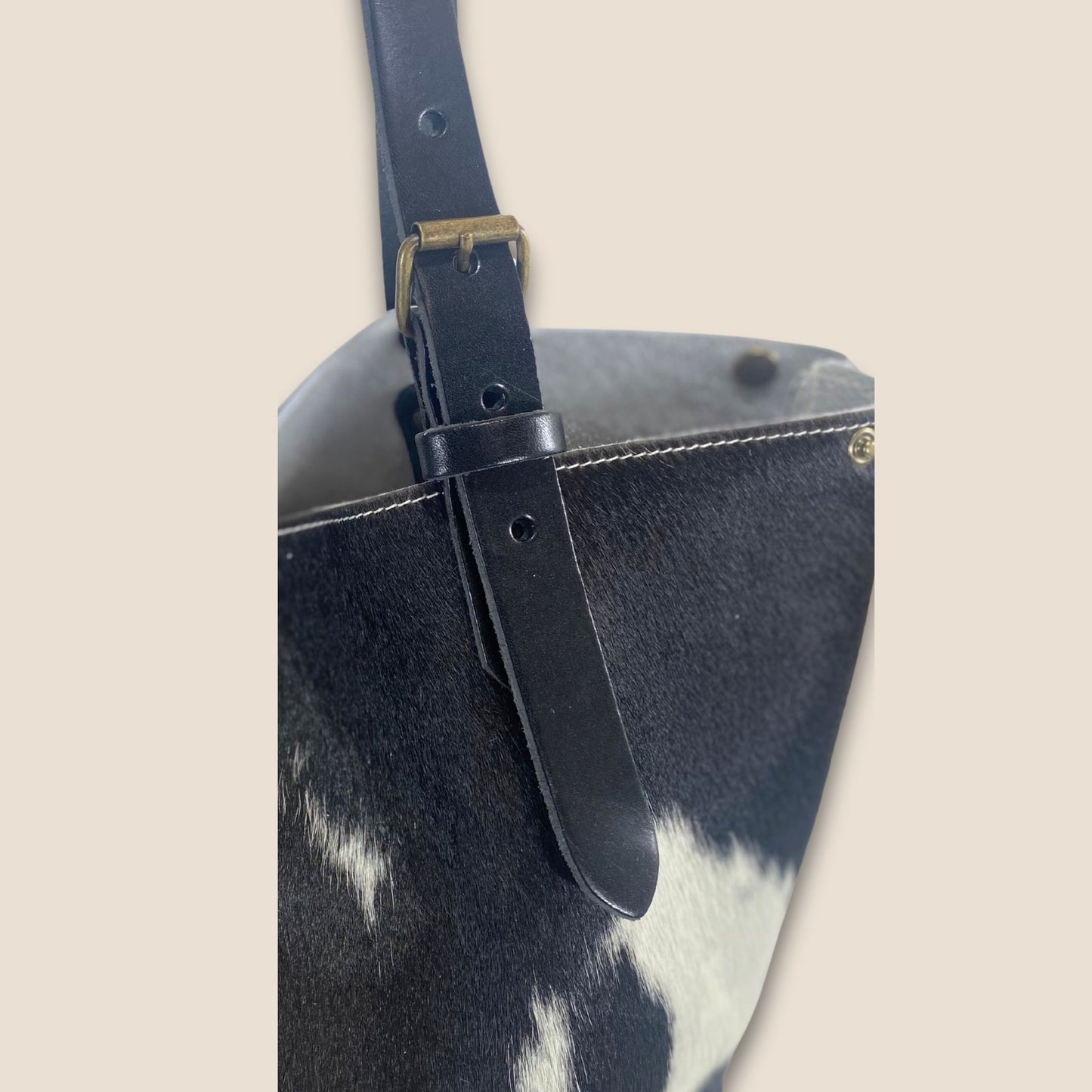 Cabas Holstein #27/129 — gros plan anses cuir noir